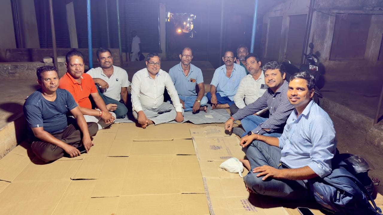 Night community meeting at market
